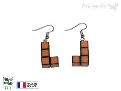 Boucle d'oreille d'inspiration brique orange