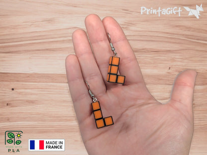 Boucle d'oreille d'inspiration brique orange