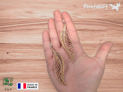 Boucle d'oreille plume